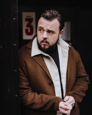 John Bradley Instagram - Interview with @squaremile_com in my bio now. Pics by @rachelanthiasherlock , styling by @hollyevawhite grooming by @tarahmakeup London December 2021.