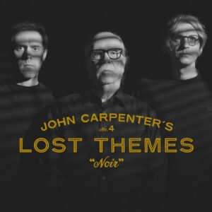 John Carpenter Instagram - Big news today! The iconic trio @johncarpenterofficial , Cody Carpenter @ludrium and @daniel_davies are back with their highly anticipated fourth installment in the Lost Themes series, Lost Themes IV: Noir. Pre-order a copy, releasing on May 3rd, on @sacredbones mail order on exclusive red splatter on clear vinyl, while supplies last! The most limited versions of the record all come with a bonus 7” “Black Cathedral” with a screen printed B side and a poster, and our mail order exclusive version comes with exclusive alternate silver foil.

It’s been a decade since John Carpenter recorded the material that would become ‘Lost Themes’, his debut album of non-film music and the opening salvo in one of Hollywood’s great second acts. Those vibrant, synth-driven songs, made in collaboration with his son Cody Carpenter and godson Daniel Davies, kickstarted a musical renaissance for the pioneering composer and director. In the years since, Carpenter, Carpenter, and Davies have released close to a dozen musical projects, including a growing library of studio albums and the scores for David Gordon Green’s trilogy of Halloween reboots. With ‘Lost Themes IV: Noir’, they’ve struck gold again, this time mining the rich history of the film noir genre for inspiration. 

John Carpenter, Cody Carpenter and Daniel Davies’s Lost Themes IV: Noir joins the 20th installment of the Sacred Bones Record Society! Enroll now to receive the album on society exclusive black and white splatter on clear vinyl, housed in a deluxe wrap-around, hand-numbered sleeve with a wax seal. The record also come with an exclusive artist curated piece of ephemera. The society exclusive version also comes with a bonus 7” and alternate silver foil. Joining these releases will be the next 2 eligible releases, each with the most limited color vinyl variant, special sleeves and artist curated ephemera. join now by purchasing Sacred Bones Society 20 on the @SacredBones website.