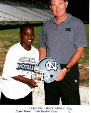 John David Washington Instagram - Shout out to chapel hill! Been ready since 96! Whaddup Rick memmber this?That's the face of a pleasantly plump kid being told by the great COACH #MackBrown I will be special. All adults out there, u never know who is listening too u hanging on ur every word and watching u. Won mvp. That year in camp btw, that's why COACH  told me that. #positive #influencer