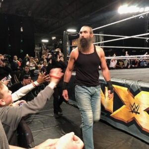 Jon Huber Instagram - Axxess photos Larry. 
I spy Khi.

Edit: Last photo of set is after Michinoku Driver to the floor.