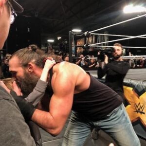 Jon Huber Instagram - Axxess photos Larry. 
I spy Khi.

Edit: Last photo of set is after Michinoku Driver to the floor.