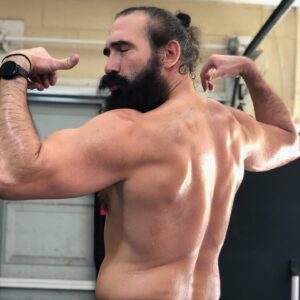 Jon Huber Instagram - Big boy back day in the garage. 

I included a certain trap for @thebrandirhodes .

Tell your man to be a man finally. 

If not,  you know where to find Daddy. 

Larry,  Champions don't rest,  they lead.  They do the Work and remain undeniable.  City of Champions for a reason. 

Live your heart and never follow. 

450# Deads 
Single Arm row
Prone Incline Row
Underhand Grip Row
Barbell Shrug
Hammer Curl
Standing plate curl with hold 
Followed by
30 minute PR on Peloton with Brandis favorite instructor Ally Love. 

@eleikosport 
@onepeloton 
@allymisslove 
@allelitewrestling 
@aewontnt