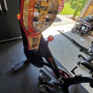 Jon Huber Instagram - Big boy back day in the garage. 

I included a certain trap for @thebrandirhodes .

Tell your man to be a man finally. 

If not,  you know where to find Daddy. 

Larry,  Champions don't rest,  they lead.  They do the Work and remain undeniable.  City of Champions for a reason. 

Live your heart and never follow. 

450# Deads 
Single Arm row
Prone Incline Row
Underhand Grip Row
Barbell Shrug
Hammer Curl
Standing plate curl with hold 
Followed by
30 minute PR on Peloton with Brandis favorite instructor Ally Love. 

@eleikosport 
@onepeloton 
@allymisslove 
@allelitewrestling 
@aewontnt
