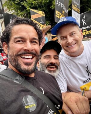 Jon Huertas Instagram - What a morning!!! Shufflin’ these #Hollywood streets with unions from across the city! The goal for us , is to shift the paradigm…to protect and even reinforce the middle class... elevate the middle class…reach back and pull people up! That’s what #leaders do…real leaders! It’s disappearing in every industry across the nation. We are marching, picketing and rallying as a call to everyone around the world to stand up for yourselves and for what is right. Something is wrong in this country when the ultra wealthy are truly cool with working class and poor people being up against the ropes and suffering. The disparity is sickening and for these corporations to continue to broadening the gaps between their CEOs/shareholders and the people that do the groundwork, we have to say enough is enough. Why not share in prosperity? So as  to bring the strength back to our country to our workers…we’re supposed to be one nation for the #people. #sagaftra #sagaftrastrong #wgastrong #fuckrobots