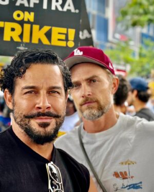 Jon Huertas Instagram - What a morning!!! Shufflin’ these #Hollywood streets with unions from across the city! The goal for us , is to shift the paradigm…to protect and even reinforce the middle class... elevate the middle class…reach back and pull people up! That’s what #leaders do…real leaders! It’s disappearing in every industry across the nation. We are marching, picketing and rallying as a call to everyone around the world to stand up for yourselves and for what is right. Something is wrong in this country when the ultra wealthy are truly cool with working class and poor people being up against the ropes and suffering. The disparity is sickening and for these corporations to continue to broadening the gaps between their CEOs/shareholders and the people that do the groundwork, we have to say enough is enough. Why not share in prosperity? So as  to bring the strength back to our country to our workers…we’re supposed to be one nation for the #people. #sagaftra #sagaftrastrong #wgastrong #fuckrobots