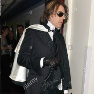 Jonathan Ross Instagram - Just a man in a cape with a handbag and a silver-topped cane. Why’s he staring?