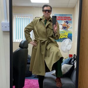 Jonathan Ross Instagram - Today’s commuting outfit. Coat, trousers, shoes Gucci. Shirt and tie Vintage. Socks Westwood. You’re welcome.
