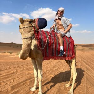 Jordan Davies Instagram - DJing to the Desert 

Day 1 was all about the DJ’ing but today was about exploring the dessert. Getting to Ride camels, sand boarding & driving buggy’s all over the desert was so much fun. 

This was always something I wanted to do when I was here & thank you to the @bnbtravelandtours for taking us on the journey. Was a day to remember. 

Tomorrow it’s back to business 😎🎧 @fivepalmjumeirah