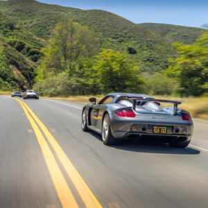 Jordan Maron Instagram - Got to go on a super cool trip last week driving with a group of Carrera GTs through Northern California. Was great to have my dad able to join me to share the experience. My driving only made his back a little sore 😬 thanks for having me @luxuryrallyclub 
📷 @dco.photography