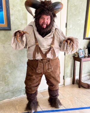 Jorge Garcia Instagram - Here’s how I made the head on my Krampus costume.
I had an old Wolfman mask where the latex on the face was starting to get crunchy. So I cut it out and kept the fur cowl figuring I’d use it for something someday. Then when this Krampus project showed up I thought it was a good place to start. I watched a horn making video on YouTube from @stiltbeaststudios. Basically you form the horns out of EVA foam. Then paint them with liquid nails to give them a nice texture. Then paint them to your liking once they dry. To attach them I made a couple of cylindrical bases which I poked through holes in the fur and contact cemented the horns to those nubs. Voila. Turned out way better than I had expected on my first try. I also got some help from my wife adding fur around the face and sewing those fur legs for me.