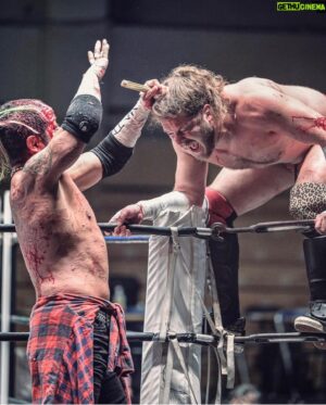 Joseph Janela Instagram - More amazing Photos from my deathmatch with @crazy_monkey0909 

Swipe for a bloody post match smooch.. 

📸: @ryoto711 @masukuman16 

#GCWJapan #gamechangerwrestling #crazymonkey #BadBoy #deathmatch