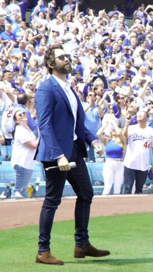 Josh Groban Instagram - Growing up in LA, I have the most incredible memories going to @dodgers games. Watching Tommy Lasorda storm the field to argue a call. Hearing the great Vin Scully on the drives to and from the stadium. The endless impossible strike outs by way of @orelhershiser55 & Fernando Valenzuela…and flash forward to a team today more talented and connected in vision than I’ve seen in my life. Dodger Stadium remains a place of pure joy for me. One thing still left on my bucket list was to sing the national anthem on that field. So I reached out and asked if I could have the honor of doing it for opening day and they said yes. I brought my folks, my love, and a heart full of gratitude for the chance to stand at home plate and honor my country, the game, and what it means to us especially in hard times. Big thanks to THE VOICE @toddleitz for making my dream come true with that announcement and to organ maestro Dieter Ruehle for accompanying me so beautifully. I love baseball. I love the @dodgers. See you again cheering from the stands. 💙

🎥: @lauramendepix