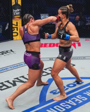 Julia Budd Instagram - thank you so much to everyone who helped me get my hands raised once again the @pflmma cage on Friday night 💎 thank you to all my training partners, family and coaches @lancegibsonsr @lancefearlessjr @eddie_cha @santinodefranco to @katiebudd for holding down the Fort back home, my mama @debmealia for flying out to see me in Atlanta because she know I needed one of her hugs and @barontara for flying down to watch the pups for us. I am so lucky to have so many great people in my life and thank you guys for continuing to believe in me. I love you all 💜
