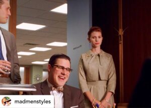 Julie McNiven Instagram - Thanks @madmenstyles 🙏 I miss Hildy.  She always stood up for yourself and made a point, but was careful not to cross the line and get fired. 
May her sourpuss (holding in all the words she wanted to say but didn’t) face, Rest In Peace. ❤️

Posted @withregram • @madmenstyles Where my Hildy stans at!!!!!! Hildy (played to true perfection by @juliemcniven) is canonically one of the “uptight” girls in the office. We’re talking high necklines, not always the brightest color palettes. But this scene where Pete tries to humiliate her in front of the other Sterling Cooper men tells us WHY. Her modest clothes (here we have a tan skirt suit with a gold brooch and hair in a tight bun but with adorable little curls at the ears) are a defense mechanism against the sexual harassment of this workplace!! This is cute with a nice fit but nothing to comment on or really notice - which is the WHOLE point so Hildy can blend in and do her job. 

Hildy likely got the same treatment that Peggy did when she first got there (women!! wear something to show off your ankles!!! We MUST see your legs!!!) but as Hildy demonstrates in this scene, this girl does NOT give into pressure!! Hildy is in a situation (which I personally have been in) where you are just trying to do your job and some man is like “hey you’re actually pretty! Smile! I want to think you like me!” I gotta be honest, in this situation I have often caved and just smiled 😬😬and left and been “nice.” but Hildy just STARES down Pete and also doesn’t give into the pressure of drinking at work!! I love a steadfast woman. 5/5 for what this fit represents ❣️
.
.
.
.
.
#madmen #madmenpics #madmenfashion #madmenstyle #madmenstyles #juliemcniven #madmenedit #madmenedits