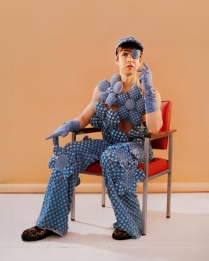 Julio Torres Instagram - 🐣🔪
Photographed by Tonje Thilesen @tonjethilesen
Styled by Angel Emmanuel @angelemmanuel
Grooming by Jessica Ortiz @jessica_o_

Headpieces by Sideara (@sideara)
Denim look & metallic shorts by Mondo Guerra @mondoguerra
Coat by Izzy Du (@izzydu 
Pants by Megan O’Cain (@_meganocain 
Interviewed by Ben Tousley @bentousley @budsdigest
