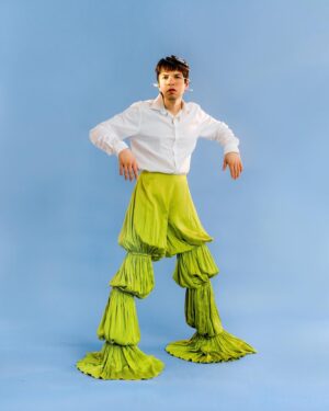 Julio Torres Instagram - 🐣🔪
Photographed by Tonje Thilesen @tonjethilesen
Styled by Angel Emmanuel @angelemmanuel
Grooming by Jessica Ortiz @jessica_o_

Headpieces by Sideara (@sideara)
Denim look & metallic shorts by Mondo Guerra @mondoguerra
Coat by Izzy Du (@izzydu 
Pants by Megan O’Cain (@_meganocain 
Interviewed by Ben Tousley @bentousley @budsdigest