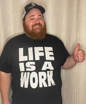 K. Trevor Wilson Instagram - Here is my “Life is a Work” shirt from @collarxelbow. To me this is the wrestling equivalent to Shakespeare’s “All the world’s a stage, and the men and women just players” To the uninformed a work is a planned part of a wrestling show, a shoot is real life.
