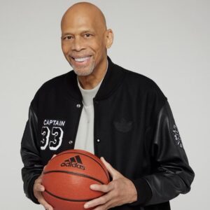 Kareem Abdul-Jabbar Instagram - Finally, a reason to get out of bed on Thursday. My official fan club, Club Skyhook, launches this Thursday, March 23, at 9 a.m. PST. There will be fighter jets in the skies, krakens in the seas, but mostly some cool rewards for those who choose to join. Here is a look at the limited Evolution of Excellence jacket by adidas and Jeff Hamilton made exclusively for VIP members of the club. But there are a lot more perks. Click on the link in the bio to sign up for the waitlist. You’ll receive an email as a reminder to sign up the morning of the drop.