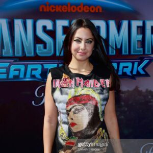 Kathreen Khavari Instagram - Thank you @hushi5 for making this beautiful IRAN Maiden shirt with her #زن_زندگی_آزادی (Woman, Life, Freedom) bandana. Transformers #earthspark comes out November 11 on @nickelodeon and @paramountplus, and I get to play a brand new Transformer robot named Twitch. 
Makeup by @harperartist 
Hair by @camilamariehair 
Tattoo by @east_01 
#مهسا_امینی