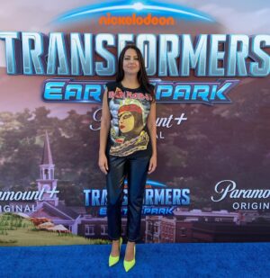 Kathreen Khavari Instagram - Thank you @hushi5 for making this beautiful IRAN Maiden shirt with her #زن_زندگی_آزادی (Woman, Life, Freedom) bandana. Transformers #earthspark comes out November 11 on @nickelodeon and @paramountplus, and I get to play a brand new Transformer robot named Twitch. 
Makeup by @harperartist 
Hair by @camilamariehair 
Tattoo by @east_01 
#مهسا_امینی