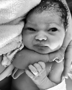 Katie Carpenter Instagram - Birth story, part 7.

I just groaned “no!” I didn’t want my sweet girl to be pulled out with a vacuum. I was lost. 

But then I remembered: We had a daughter coming soon. It was up to me to get her here. I pushed. 

It had been 34 hours since my water broke. I’d been actively contracting for 21 hours. I couldn’t remember life before discomfort. 

And then all of the sudden - she was here. No head then body, just all at once, here was our baby. She was crying and looking around with her big eyes. I was in shock it was finally over. 

Then we learned why things were so hard. Her cord was incredibly short. We couldn’t get her above my belly button. My placenta was high so poor girl had a hard time getting down on her little bungee cord. 

Kevin cut the cord after it stopped pulsing, and I brought this little stranger to my chest. She was so alert. REALLY cute. I couldn’t believe she was ours. 

My placenta came out a few minutes later. Poor Kevin looked down at just the right time. 😆 

Our little girl nursed right away. The adventure continued as I had a 2nd degree tear which required stitches. But - I had our baby in my arms. Finally!! 

Despite this not being the plan, despite an incredible amount of pain and interventions that we didn’t expect, I didn’t feel that I had a “bad birth.” I’m so thankful we switched to a hospital birth in advance so I had time to mourn and adjust. I’m thankful we were able to get help when interventions were needed. 

And despite every new challenge, I’m thankful that all of our decisions felt like a collaboration rather than made for us. We were respected, something that I worried about after hearing hospital horror stories, and so well taken care of. 

After researching short umbilical cords, I found they double the chances of complications and more often, lead to c-sections. We ended up being where we needed to be with the right team to get this girl safely here. 

I am grateful for our doulas, Courtney & Lauren, the midwives, and the labor and delivery staff at North Fulton hospital for taking care of us.

Labor was another lesson. Make plans, but be open to whatever the universe brings. Thanks for following along ❤️
