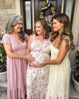 Katie Carpenter Instagram - Baby in bloom 🌻

Thanks to my mama @nancycarpenter27, my sister @alexiscarpenter, and my aunt Patty for making this a special day! 💗 they hand painted all the decor and had a ton of fresh flowers. 🌼 It was intimate and beautiful. 

Things are feeling more and more real. And one of the coolest parts is both my mom and my sister got to feel the baby kick!! 

I was hoping the stars would somehow align but we don’t live close so I didn’t know if it would be possible. Baby showed up for them. 👶🏼

Can’t wait to introduce her in a few months! 

And yes - dress #2 won!! Thanks for all your feedback. 🤗