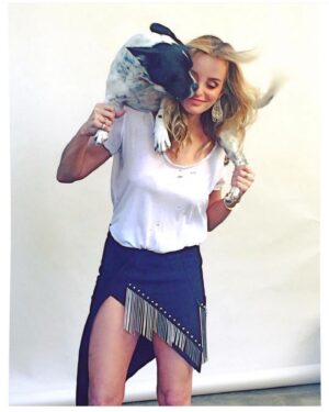 Katie Nehra Instagram - I have been looking at past pictures… reminiscing. I was doing press for a film and the photographer asked me if I minded if he let his dogs out. Obviously I was like, please! The guy on my shoulders name is Jack White. He had 4 dogs and having them on set made the day that much more fun. After the shoot I vowed to never spend another day without an animal. The next week I rescued Arthur. 🐾