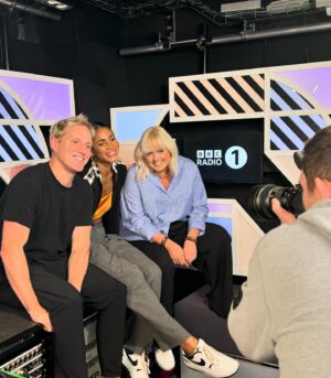 Katie Thistleton Instagram - Introducing your new Radio 1 drive time show - Going Home with Vick, Katie and Jamie! 
I’m still in shock at this news tbh, co-hosting Radio 1 drive is beyond my wildest dreams, I feel like I’m living in a simulation. Presenting alongside Vick is one of my favourite things in the world, she is the best co-host, most incredible person and broadcaster and one of my best friends, and I’m such a big fan of the lovely hilarious Jamie who is just a DREAM, he’s had me in stitches every time I’ve heard him on the radio, plus we can share so many blonde hair maintenance tips. 
I’ve loved filling in on this show over the past couple of years with Vick and Jordan and have learnt so much from both of them. 
The listeners are always so up for it and I already know the 3 of us are gonna have such a nice time and it’s going to be fun chaos, so please come and join us for the ride and I promise we’ll do our best to give everyone a great listen. ARGHHGGGGGGGG SO HAPPY I MIGHT BURST. 
Ps. This also means I’m moving to ‘LUNDUN!!?!’ so tips welcome, I’m just a silly northerner who knows nothing about life in the big smoke.