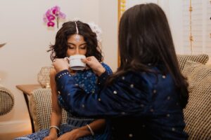 Kausar Mohammed Instagram - The Mesa-Gustin family came to the Mohammed home with gifts and baskets and asked for each other's daughters hands in marriage! Thank god everyone said yes! Favorite part of the Meetha-Muh? The pista milk (pistachio milk). 🫖Our Nurbibi Nanny made it with all the blessings. There was henna for the family and yes, Amalia’s shoes were stolen by the other side and only returned after a long negotiation (that included not just money, but a promise for both brides to get better at Urdu). Catch us in a year and find out! 🌀🧿💙

The next day was our civil ceremony was held with immediate family in our own little way… can’t wait to share. ☺️

📷: @lovekemedia