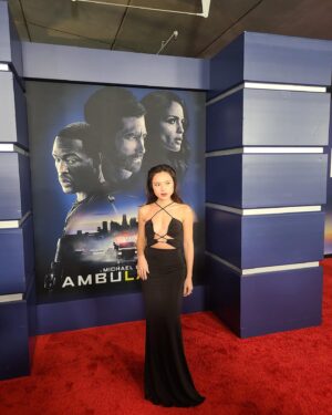 Kayli Tran Instagram - Would you risk it all if I was your bank teller? Officer Zach did. 💅

Lmao 😝 Catch me as Kim on Ambulance out in theaters Friday 4/8!

#ambulancemovie #michaelbay #asianactor #asianactress #dienvien #rescarpet #cutoutdress #blackdress