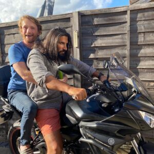 Kayvan Novak Instagram - Sometimes you just feel like throwing caution to the wind and sitting on a friend’s motorcycle so you can both pretend to be characters from one of your favourite 80’s TV cop shows.. #friendsreunited❤️