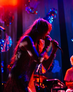 Kazu Makino Instagram - off we go, kicked off in LA which was nerve wrecking as we love them angels so much and the last show will be in London on dec 12. after all we are rewarded with amazing crew…the beautiful backdrop by @mgodoynieto  sets the mood. we hope to see y’all  at the show. my dreamy outfits by one and only @isabelmarant #tour #music #theband #readyornot all pics by @travistrautt