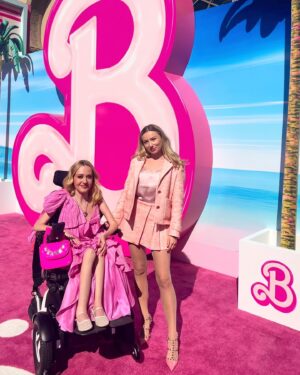 Keely Cat Wells Instagram - Disabled Barbie’s Unite! 

Wow what a night! (and few days)

It was such fun and an honour to have worked on the accessibility of the Barbie World Premiere with @jimlebrecht @natasha_ofili @elainehallcoach @erynedel @kaitlynyang @theyangfei @1in4coalition Hannah Warren

Thank you @wbpictures for recognising that accessibility is a necessity, priority and should never be an afterthought. 

It was incredible to see so many Disabled icons at this mainstream event. This is what every guest list should look like. 

@barbiethemovie is definitely a must see. Greta Gerwig knocked it out of the park!

And now, to catch a flight to Washington D.C ✈️ 

Image descriptions: 1) Madison Lawson & Keely are on the pink carpet, both dressed in pink and behind them is a giant Barbie “B”. 2) Lachi, Elaine Hall, Tiffany Yu and Keely are on the pink carpet, posing and channelling Barbie vibes! In front of the pink “B”. 3) Natasha Ofili, Jim LeBrecht and Keely are in front of a Barbie sign that says “real wells this way” and a Barbie car. 4) Keely standing in front of a pink Barbie lighthouse flipping her hair slightly. 6) James Ken Blackmon standing in front of a giant packaged car wearing a pink fringed shirt looking over his sunglasses. 

#RepresentationMatters #DisabledBarbie #AccessibleBarbie #BarbieTheMovie #Barbie