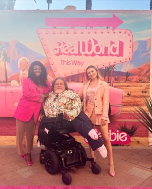 Keely Cat Wells Instagram - Disabled Barbie’s Unite! 

Wow what a night! (and few days)

It was such fun and an honour to have worked on the accessibility of the Barbie World Premiere with @jimlebrecht @natasha_ofili @elainehallcoach @erynedel @kaitlynyang @theyangfei @1in4coalition Hannah Warren

Thank you @wbpictures for recognising that accessibility is a necessity, priority and should never be an afterthought. 

It was incredible to see so many Disabled icons at this mainstream event. This is what every guest list should look like. 

@barbiethemovie is definitely a must see. Greta Gerwig knocked it out of the park!

And now, to catch a flight to Washington D.C ✈️ 

Image descriptions: 1) Madison Lawson & Keely are on the pink carpet, both dressed in pink and behind them is a giant Barbie “B”. 2) Lachi, Elaine Hall, Tiffany Yu and Keely are on the pink carpet, posing and channelling Barbie vibes! In front of the pink “B”. 3) Natasha Ofili, Jim LeBrecht and Keely are in front of a Barbie sign that says “real wells this way” and a Barbie car. 4) Keely standing in front of a pink Barbie lighthouse flipping her hair slightly. 6) James Ken Blackmon standing in front of a giant packaged car wearing a pink fringed shirt looking over his sunglasses. 

#RepresentationMatters #DisabledBarbie #AccessibleBarbie #BarbieTheMovie #Barbie