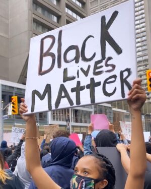 Keeya King Instagram - The reason no one can ever find the words, is because there are no words that anyone can string together to truly encapsulate the years of systematic oppression and violence upon Black lives. There are no words that can get down to the core of the subtleties of the Black experience. Language will continue to fail to express the trauma we are currently facing and have faced for decades upon decades. Regardless, we must try anyways. We must use our voice, anyways. Cement our experiences into history.

On May 30th 2020, I marched with my Toronto Community. We marched for Regis Korchinski-Paquet, Tony McDade, George Floyd, Ahmaud Arbery, Sandra Bland, all Black lives across North America.  Yes, we are fighting against police brutality, but we are also fighting for the world to recognize the value of Black Lives. We chanted, we screamed, we played music, we danced, we cried. We unified and will continue to unify even after the protesting has simmered. We are awakened. We are coming into our power. We are standing in our power. ⠀⠀⠀⠀⠀⠀⠀⠀⠀⠀⠀⠀ ⠀⠀⠀⠀⠀⠀⠀⠀⠀⠀⠀⠀ ⠀⠀⠀⠀⠀⠀⠀⠀⠀⠀⠀⠀ ⠀⠀⠀⠀⠀⠀⠀⠀⠀⠀⠀⠀ ⠀⠀⠀⠀⠀⠀⠀⠀⠀⠀⠀⠀
Thank you to @notanotherblacklife for organizing a space for all to grieve but also to feel uplifted by the energy. Thank you to the leaders of the Black communities stretching from Toronto, Montreal, Minneapolis, LA, Houston, all over. ⠀⠀⠀⠀⠀⠀⠀⠀⠀⠀⠀⠀ ⠀⠀⠀⠀⠀⠀⠀⠀⠀⠀⠀⠀ ⠀⠀⠀⠀⠀⠀⠀⠀⠀⠀⠀⠀
To all the Black Women and men that exist on this earth. I love you. Stay safe and please always find ways to rest and take care of your mental health. ⠀⠀⠀⠀⠀⠀⠀⠀⠀⠀⠀⠀ ⠀⠀⠀⠀⠀⠀⠀⠀⠀⠀⠀⠀ ⠀⠀⠀⠀⠀⠀⠀⠀⠀⠀⠀⠀ ⠀⠀⠀⠀⠀⠀⠀⠀⠀⠀⠀⠀ ⠀⠀⠀⠀⠀⠀⠀⠀⠀⠀⠀⠀
Note:
These are not generic photos, these are photos that I took while protesting in Toronto. It’s come to my attention that some white people are sharing my photos and pretending to be part of the protest. This is wrong, give credit, and stop erasing Black Women from the movement.