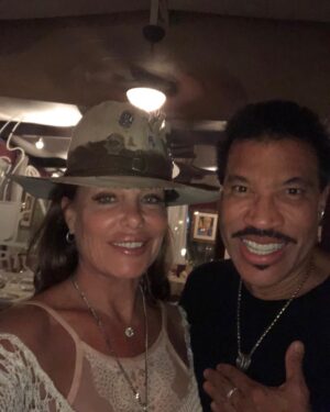 Kelly LeBrock Instagram - I can see it in his EYES 👀, I can feel it in his touch !!! Too much fun with the mega man Lionel Richie ❤️