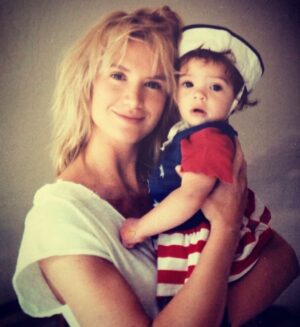 Kelly Lynch Instagram - Happy Birthday my darling Shane! ❤️

You are a beautiful, talented, hilarious, original, adorable wonder beloved by all who know you, and the sunshine of my life ☀️

What an amazing adventure these years have been with you by my side. I love you beyond love, and I’m so damn lucky to be your Mama! 🍀

1st 📸 @deweynicks for @ccaliforniastyle 
2nd 📸 @greggormanphoto for @roots