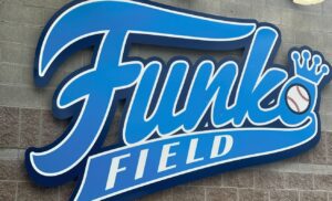 Kelsey Lewin Instagram - I’ve always wanted to sponsor a minor league baseball team and am incredibly stoked to have our little sign here at Funko Field for the @everettaquasox :’) maybe someday it can even be a big outfield sign! Go frogs! 🐸