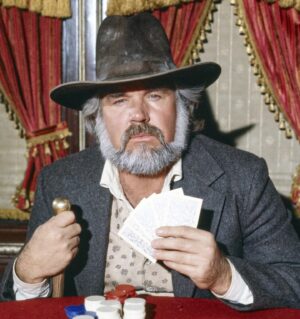 Kenny Rogers Instagram - Every gambler knows
That the secret to survivin'
Is knowin' what to throw away
And knowin' what to keep…

{📷: CBS/Getty Images} -Team KR