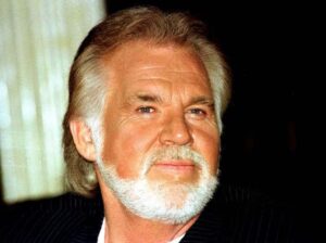 Kenny Rogers Instagram - #onthisday in 1995, Kenny Rogers had quite an ace up his sleeve in Las Vegas at the Imperial Palace Hotel & Casino. He filled in for KR impersonator Mark Hinds on “The Gambler” and “Ruby” during Mark’s show and then joined Dolly Parton impersonator Sandy Anderson for “Islands in the Stream.” The audience was not told the real Kenny Rogers would be appearing. -Team KR