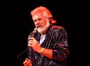 Kenny Rogers Instagram - “I do ballads that say what every man wants to say and that every woman wants to hear.” -Kenny Rogers

What’s your favorite KR love song? 

#happyvalentinesday 

-Team KR

📷: Paul Natkin/Getty
