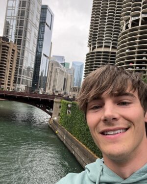 Kevin G. Quinn Instagram - I’m back home for the first time in 4 years and doing my favorite thing - roaming around the city streets. Feels good to be back. Side note, does anyone recognize these buildings behind me from a very famous album cover? Hint: Wilco…