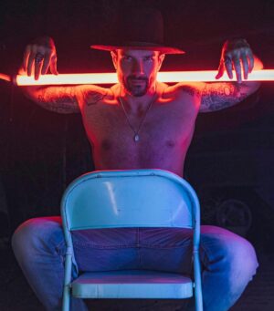 Kevin McNamara Instagram - Neon Cowboy. 
•
(Favorite Shot?)
•
📸: @jhairguerrero 
#fit #fitness #print #fitfam #fitspo #fitnessmotivation #fitnessjourney #tattoo #tattoos #guyswithtattoos #inked #ink #model #malemodel #vibes #neon #hat #style #fashion #artist #art