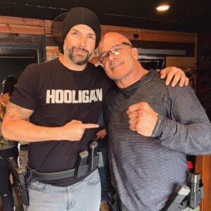 Kevin McNamara Instagram - Great day at the range with MMA the legends!!!
@basruttenmma 
@lukerockhold 
@chuckliddell 
@tarantactical