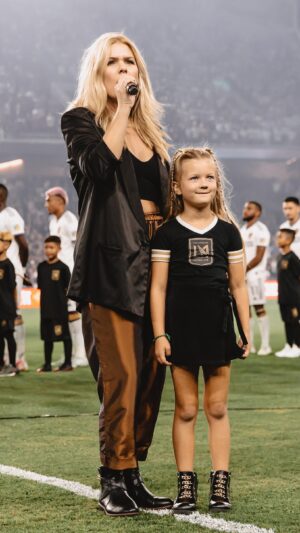 Kimberly Caldwell Instagram - Thanks for letting me start the fire to ultimately kick some playoff ass. Almost forgot I had it in me. 🇺🇸🔥🎙 #bestsidekick #blackandgold