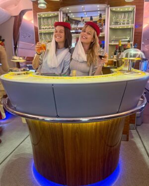 Kimberly Caldwell Instagram - Our Sex and The City moment on @emirates sipping cocktails in the lounge with Axel Rose! Can’t make this shit up. See you in Maldives Auntie Tunde ✈️ #sistertrip