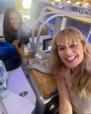 Kimberly Caldwell Instagram - Our Sex and The City moment on @emirates sipping cocktails in the lounge with Axel Rose! Can’t make this shit up. See you in Maldives Auntie Tunde ✈️ #sistertrip