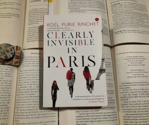 Koel Purie Instagram - ⏩ Which city do you want to visit once since childhood?
 
🗼 Clearly Invisible in Paris by Koel Purie Rinchet is one of the most complex books yet it will put you in a daze.

🗼To be honest, I wanted to visit Paris when I was daydreaming of travelling, and the way this book portrayed Paris will create your own image of Paris in your mind.

🗼This book revolves around four girls from completely different backgrounds coming to a city—a city that they want to be "home" for them, which seems impossible, but eventually Paris becomes their identity, their world away from their other world.
 
🗼With its beautiful and rich vibes, its blurb attracted me in seconds, like I hadn't even thought of anything and went for this one, and this was one of my great choices.

🗼 Neera , a girl living a luxurious life with her rich husband,
While Rosel struggles with her life to have a stable life in Paris so she can bring her son some happiness, she works as a housekeeper (nanny).
 
🗼Dasha is a girl who is comforting for everyone, but sometimes she forgets to comfort herself, wanting to walk on the ramp like she owns the world.
 
🗼Violet, a trans woman and strong, beautiful dancer
 
🗼All these 4 girls are living in Paris & fighting their own battles differently, yet they are all connected to each other in a beautiful way—a way where all 4 show an attitude of "never giving up".

🗼It shows the struggles of people who have immigrant status; it shows pain & anger.

🗼The insecurities of friendship where you're the one who is alone despite of being there 4 others.

🗼 The insecurities of a woman who works hard to earn where she can feel her family slipping from her hand, losing them to a housekeeper.

🗼A trans woman who tried to help someone who deserves the world—a bagger—but was betrayed by that person in front of the world.

🗼A woman who loses an important person, her husband, in a COVID battle feels numb in the full lights of Paris.

🗼However, sometimes I feel that there is too much explanation given, which makes me understand the story.

🗼But the plot literally put you in a daze, exploring a painful life yet full of wit, wisdom, and laughter.

Continue in pinned comments 👇