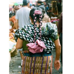 Kota Eberhardt Instagram - I snapped this photo of a Mayan woman browsing a marketplace in San Pedro. It is truly remarkable that over 6 million people continue to identify themselves as Mayan today, and that in Guatemala alone they still make up over 1/2 the country's overall population! They have been conquered twice, most notably by the conquistadors, enslaved and nearly erased as relevant to modern history. But as one student said it best "while conquest may darken their lives, it has yet to distinguish their culture." Be indelible, invincible, incredible enough to be unforgettable.  #braidgamestrongthough #35mmfilm #tribe #mayanpeople #AINTNOWIFi #lakeatitilan #lagoatitilan