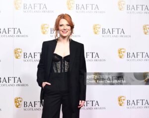 Krysty Wilson-Cairns Instagram - Dreamy night at the BAFTA Scotland Awards 2023 hair by @rachaelrri and make up by @taitmakeup - actual glam wizards the both of them ♥️♥️♥️ suit @burberry corset @agentprovocateur (the gleam in my eyes courtesy of the pizza crunch I ate for lunch.) thank you @baftascotland for the most fun awards show! #baftascotawards
